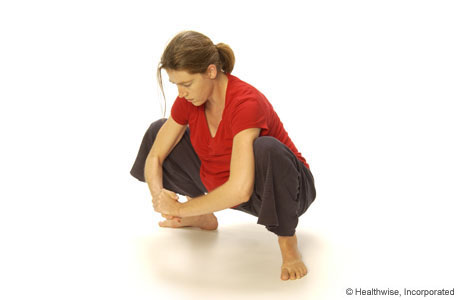A woman squatting