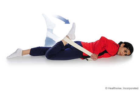 A person doing a quadricep stretch (face down).
