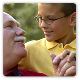 Photo of a young boy with an elderly man