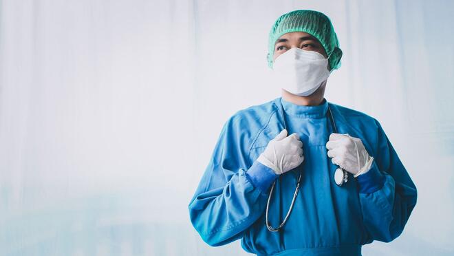 Health care worker wearing personal protective equipment