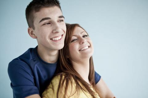 couple embracing and smiling