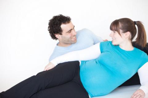 pregnant woman and man relaxing