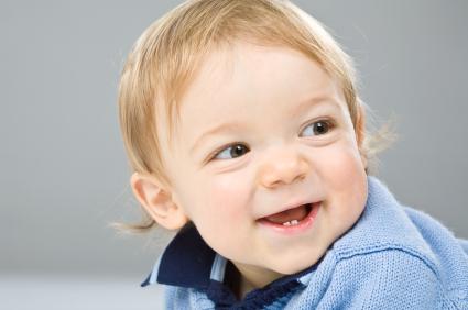 toddler smiling with mouth open
