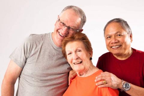 older adults laughing and smiling