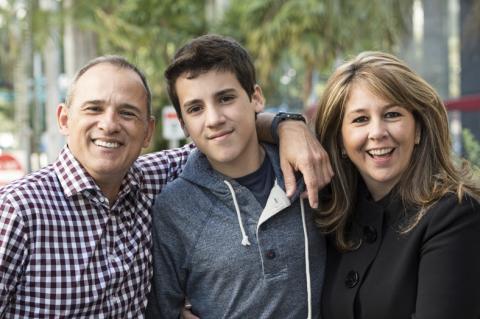 teenage boy with his mom and dad
